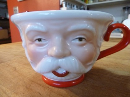 a creepy Santa mug is the perfect thing to serve it in.